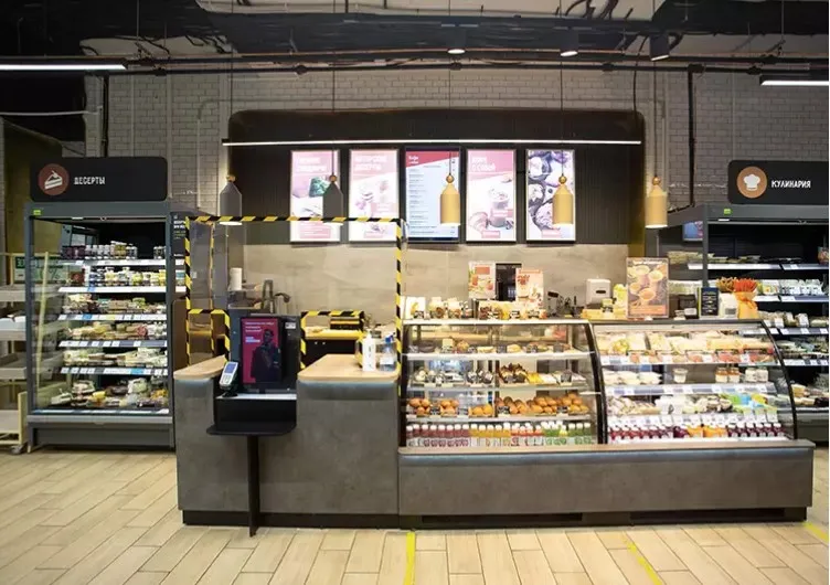 Photo of a VkusVill café featuring the Decker digital menu board system.